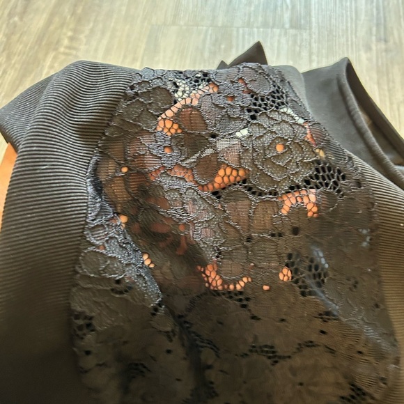 Molly Bracken Elegant Sleeveless Black Dress with Lace and Bow Details - Picture 7 of 13